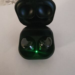 Samsung Black Earbuds with Green Indicator